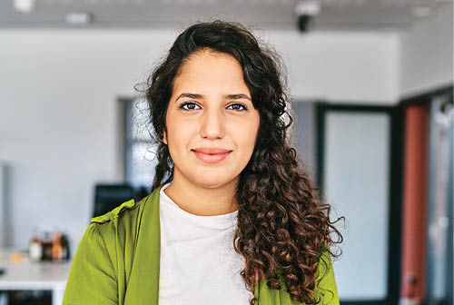 Woman looking at camera with smiles