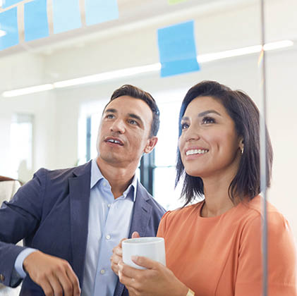 Two co-workers brainstorming together