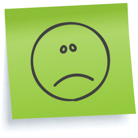 An image of a sticky note with a sad face